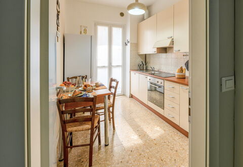 Lory House: Flooring, Floor, Interior Design, Wood, Ceiling, Furniture, Countertop, Room, Lighting, Kitchen