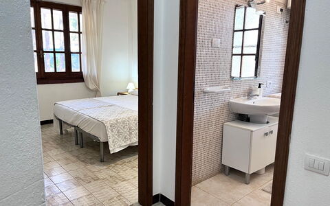 Villasimius 674: Floor, Wall, Interior Design, Flooring, Wood, Furniture, Bedroom, Bed, Apartment, Lighting