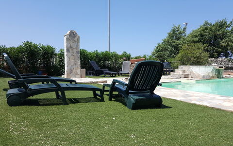Residenza Agnese Sardegna: Outdoor Furniture, Lawn, Garden, Shade, Artificial Turf, Yard, Backyard, Landscaping, Chair