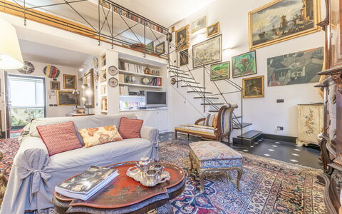 Portello Square Lux Apartment Genova: Wall, Apartment, Furniture, Interior Design, Home, Living Room, Couch, Chair, Houseplant, Hotel