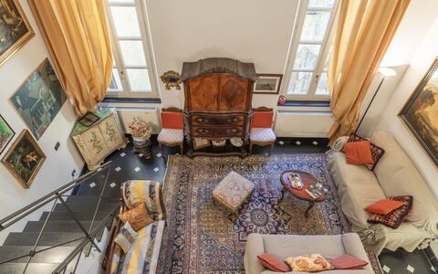 Portello Square Lux Apartment Genova: Furniture, Interior Design, Wall, Wood, Flooring, Floor, Living Room, Lighting, Room, Couch