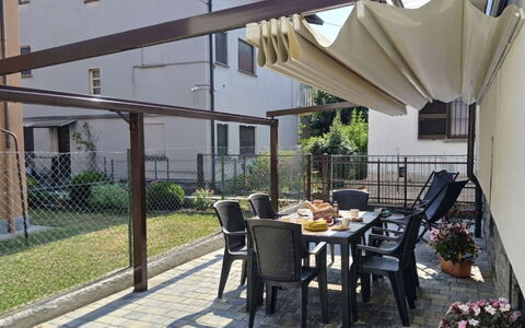 Irene: Shade, Awning, Flowerpot, Outdoor Structure, Houseplant, Porch, Balcony, Backyard, Garden, Chair