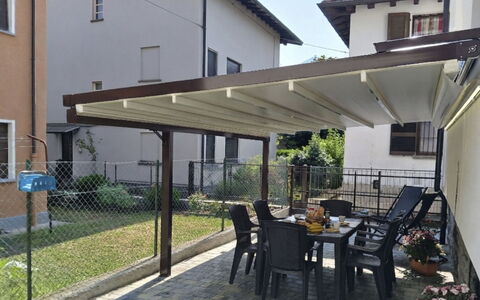 Irene: Awning, Shade, Outdoor Structure, Pergola, Canopy, Patio, Beam, Flowerpot, Courtyard, Yard
