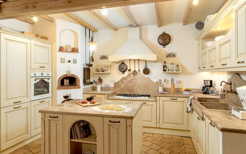 Villa Elsa di Bibbiano Pool, Sauna and View: Kitchen, Furniture, Interior Design, Wood, Cabinetry, Flooring, Countertop, Floor, Home, Ceiling
