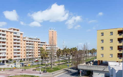 Suite Artemare: Building, Urban Area, City, Residential Area, Apartment, Neighbourhood, Metropolitan Area, Architecture, Condominium