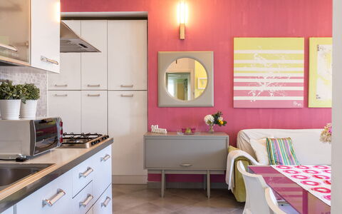 Suite Artemare: Furniture, Interior Design, Kitchen, Pink, Lighting, Room, Home, Flooring, Table, Light Fixture