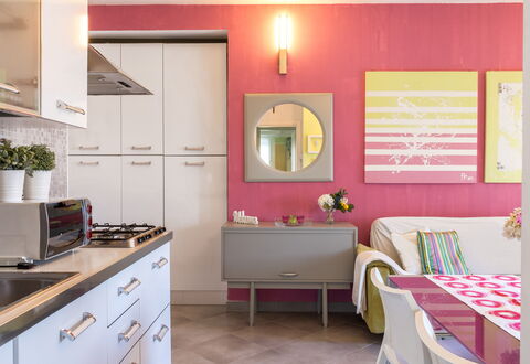 Suite Artemare: Furniture, Interior Design, Kitchen, Pink, Lighting, Room, Home, Flooring, Table, Light Fixture