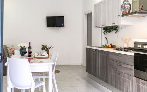 La Rondine Apartment: Furniture, Kitchen, Kitchen Appliance, Major Appliance, Interior Design, Countertop, Wood, Flooring, Cabinetry, Home Appliance