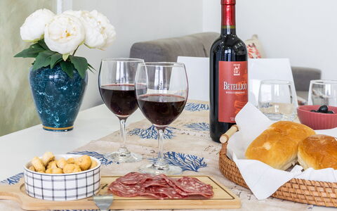 La Rondine Apartment: Food, Tableware, Ingredient, Stemware, Wine Glass, Drinkware, Table, Wine, Bottle
