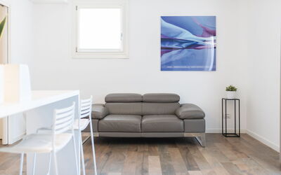 Suite Acqua - Raro Rooms Collection - Santo Stefan: Furniture, Interior Design, Flooring, Floor, Wall, Wood, Wood Flooring, Couch, Living Room, Home