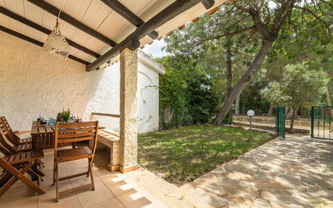 Casa ai Mandorli: Shade, Backyard, Porch, Garden, Flagstone, Estate, Outdoor Furniture, Chair, Outdoor Structure, Yard