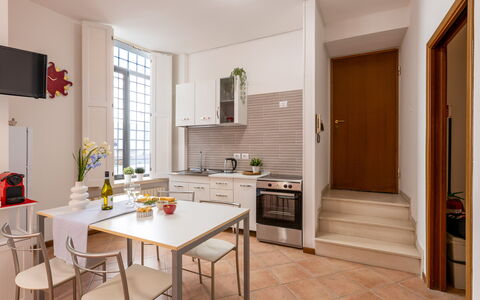 Movie Suite Jesi: Furniture, Flooring, Interior Design, Kitchen, Wood, Floor, Countertop, Chair, Table, Kitchen Appliance