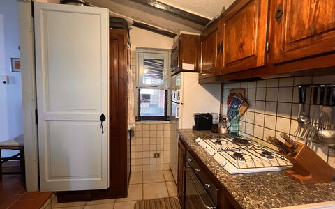 Villetta Oasi Belvedere, Budoni, Wifi, Ac: Countertop, Kitchen, Cabinetry, Flooring, Major Appliance, Wood, Kitchen Appliance, Furniture, Interior Design, Floor