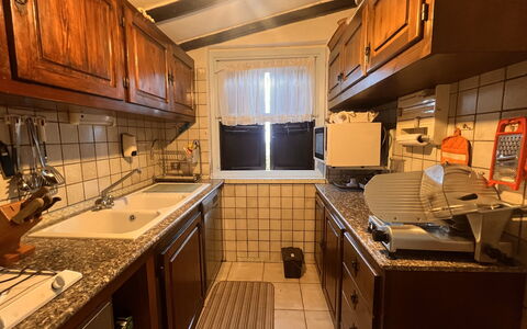 Villetta Oasi Belvedere, Budoni, Wifi, Ac: Kitchen, Countertop, Major Appliance, Cabinetry, Wood, Flooring, Interior Design, Kitchen Appliance, Furniture, Floor