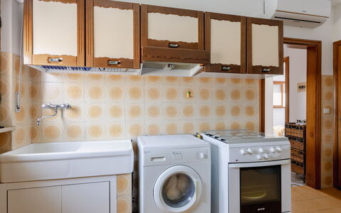 La Terrazza Sul Conero: Major Appliance, Wood, Flooring, Interior Design, Kitchen Appliance, Floor, Washing Machine, Kitchen, Cabinetry, Ceiling
