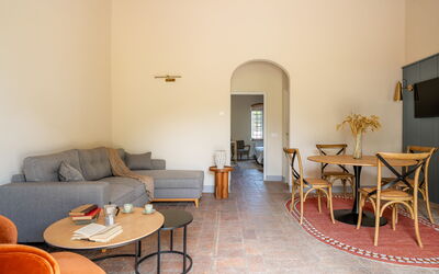 Relais Badia a Passignano - Appartamento Chardonna: Flooring, Furniture, Interior Design, Floor, Ceiling, Chair, Room, Kitchen & Dining Room Table, Wood Stain, Living Room