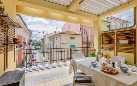 Casa Ballerini: Door, Balcony, Apartment, Flowerpot, Houseplant, Porch, Chair, Paint, Wood Stain, Handrail