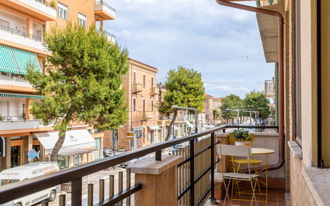 Casa Ballerini: Daytime, Building, Window, Apartment, Town, Urban Area, Facade, Neighbourhood, Residential Area, Urban Design