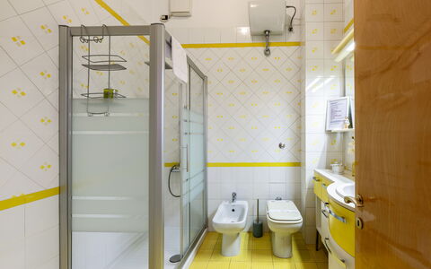 Casa Ballerini: Interior Design, Flooring, Plumbing Fixture, Yellow, Floor, Bathroom, Toilet, Plumbing, Toilet Seat, Tile