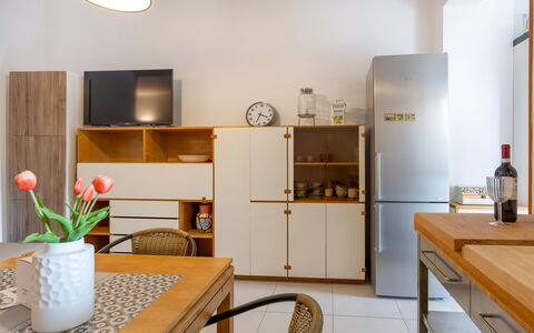 Casa Ballerini: Furniture, Interior Design, Flooring, Cabinetry, Wood, Shelving, Floor, Kitchen, Kitchen Appliance, Shelf