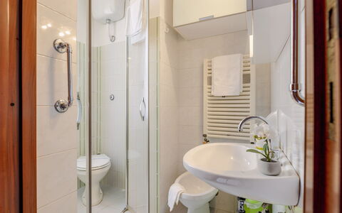 Suite Acquamare: Interior Design, Floor, Flooring, Room, Furniture, Bathroom Sink, Plumbing Fixture, Sink, Toilet, Ceiling