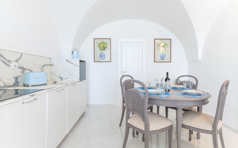 Villa Augusta Vista Mare: Furniture, Interior Design, Flooring, Table, Floor, Chair, Room, Kitchen & Dining Room Table, Ceiling, Dining Room
