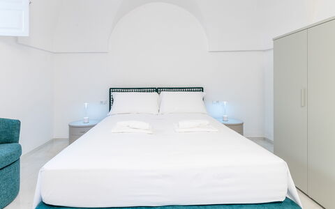 Villa Augusta Vista Mare: Interior Design, Floor, Furniture, Flooring, Bedroom, Ceiling, Bed, Bedding, Bed Sheet, Bed Frame