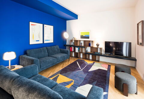 Il Monumento: Furniture, Blue, Interior Design, Flooring, Wall, Couch, Floor, Ceiling, Living Room, Room