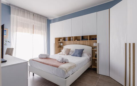 Altamarea Apartment: Furniture, Bed, Interior Design, Bedroom, Bedding, Bed Sheet, Wood, Flooring, Linens, Room