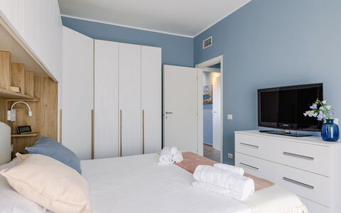 Altamarea Apartment: Furniture, Bedroom, Interior Design, Bed, Flooring, Floor, Wood, Textile, Bed Sheet, Room