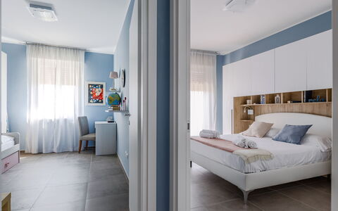 Altamarea Apartment: Furniture, Interior Design, Bedroom, Bed, Flooring, Floor, Wood, Ceiling, Home, Room