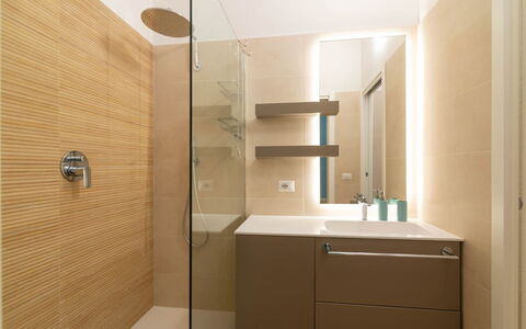Vittoria Suite: Bathroom, Interior Design, Flooring, Bathroom Sink, Floor, Plumbing Fixture, Wall, Mirror, Bathroom Cabinet, Wood