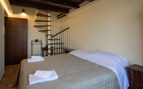 Villa Leone Reale: Bed, Bedroom, Furniture, Floor, Interior Design, Wall, Flooring, Wood, Ceiling, Bed Sheet