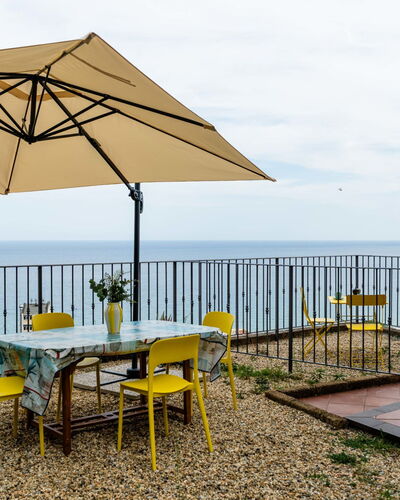 Ginestra: Furniture, Outdoor Furniture, Chair, Table, Umbrella, Outdoor Table, Sea, Shade, Ocean, Kitchen & Dining Room Table