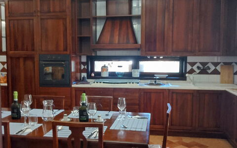 Villa Ginevra: Furniture, Flooring, Interior Design, Wood, Cabinetry, Floor, Lighting, Light Fixture, Kitchen, Countertop