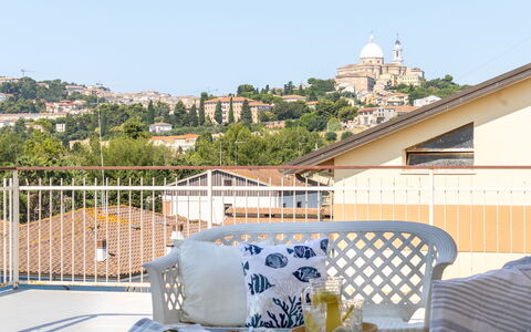 Sopraloreto Apartment: Furniture, Interior Design, Home, Apartment, Chair, Balcony, Houseplant, Outdoor Furniture, Flowerpot