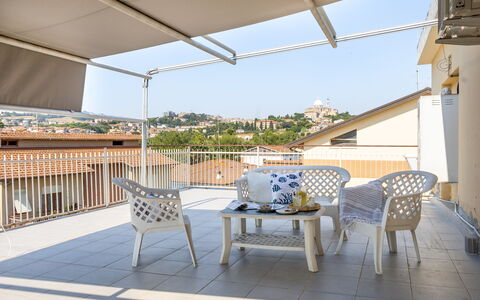 Sopraloreto Apartment: Furniture, Chair, Balcony, Outdoor Furniture, Shade, Outdoor Structure, Awning, Umbrella, Houseplant, Outdoor Table