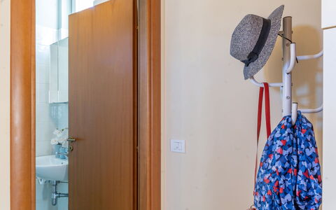 Sweet Conero: Interior Design, Flooring, Floor, Room, Wood Stain, Clothes Hanger, Varnish, Hardwood, Design