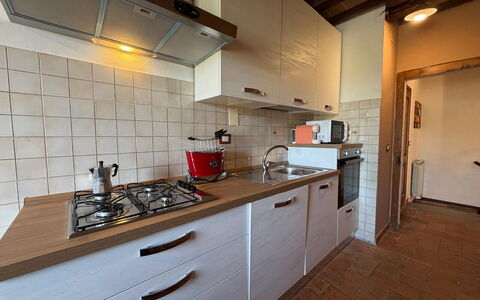 Appartamento Del Mercato: Kitchen, Countertop, Kitchen Appliance, Kitchen Sink, Flooring, Major Appliance, Wood, Cabinetry, Interior Design, Kitchen Stove