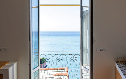 Newly Renovated Ocean View Flat: Wood, Flooring, Floor, Door, Home Door, Sea, Wood Flooring, Ocean, Balcony, Hardwood