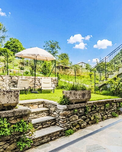Beppe: Garden, Outdoor Furniture, Landscaping, Flagstone, Eco Hotel, Outdoor Table, Yard, Estate, Chair, Backyard