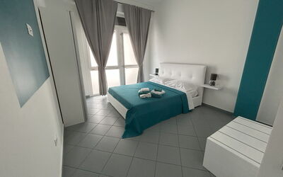 Appartamento Briseide: Furniture, Floor, Flooring, Interior Design, Room, Bedroom, Bed, Apartment, Chair, Bedding