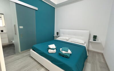 Appartamento Samuda: Furniture, Flooring, Floor, Interior Design, Bedroom, Room, Bed, Apartment, Bedding, Bed Sheet