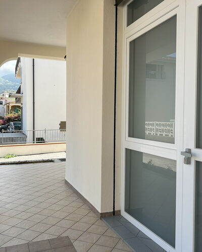 Case Martorelli - Belvedere Marittimo: Floor, Apartment, Balcony, Glass, Handrail, Daylighting, Home Door, Aluminium