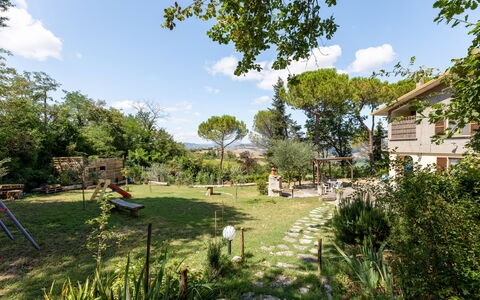 La Pineta Holiday Homes: Tree, Shrub, Garden, Rural Area, Backyard, Spring, Lawn, Landscaping, Yard