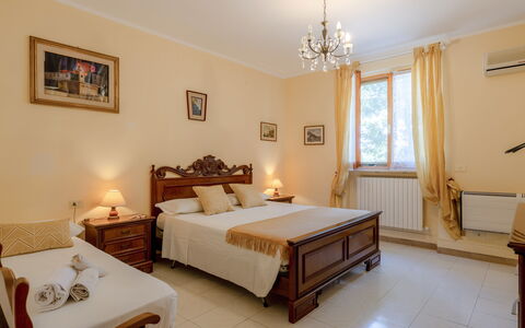 La Pineta Holiday Homes: Furniture, Bed, Interior Design, Bedroom, Bed Sheet, Flooring, Wood, Bedding, Floor, Room