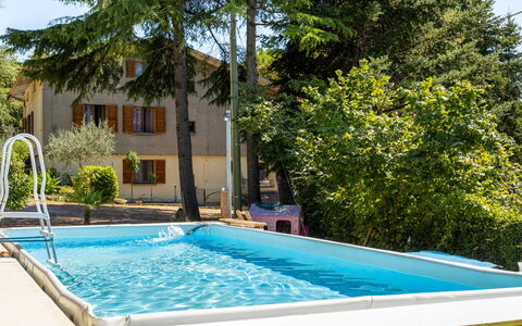 La Pineta Holiday Homes: Blue, Swimming Pool, Composite Material, Leisure, Resort, Outdoor Furniture, Shade, Eco Hotel, Backyard, Hotel