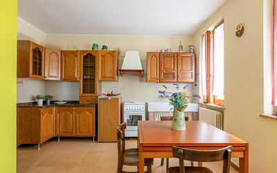 Alfa Apartment: Furniture, Wood, Flooring, Interior Design, Floor, Kitchen, Cabinetry, Kitchen & Dining Room Table, Lighting, Room