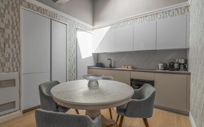 Deservi Elegant Apt. Petrarca: Furniture, Interior Design, Flooring, Wood, Floor, Kitchen, Countertop, Lighting, Cabinetry, Room
