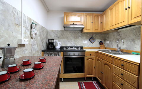 Baita Costa Di Gial: Kitchen, Kitchen Appliance, Countertop, Major Appliance, Cabinetry, Furniture, Interior Design, Wood, Flooring, Home Appliance